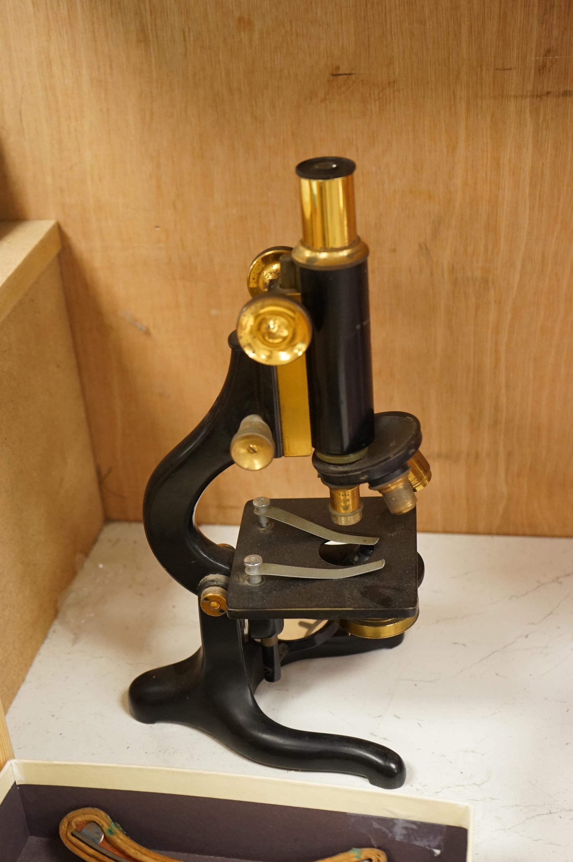 A parchment Indenture of Apprenticeship as a Surgeon and Apothecary between Nicholas Adams and Robert Seymour Adams of Hampshire, dated 1849, an early 20th century monocular brass microscope by W. Watson & Sons, 31cm hig